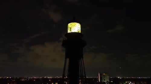 A night shot of a lighthouse in South Florida