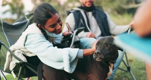 Woman, camping and relax with dog, nature and forest with smile, playing
