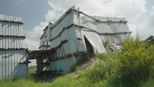Slow panning left reveal, strange mysterious structure, abandoned place