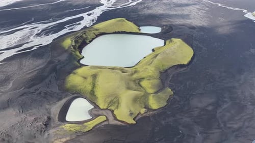 Aerial view of green hills and lakes, Iceland.
