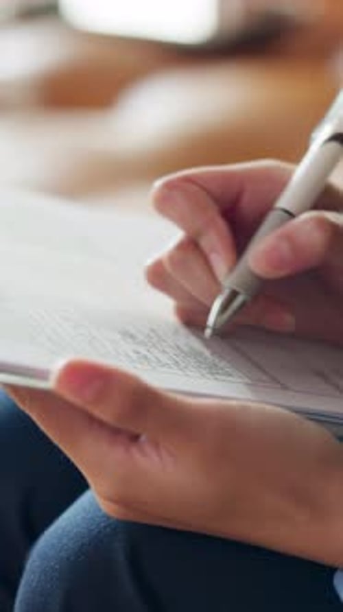Hands, nurse and writing on clipboard at clinic for diagnosis, report and admin for healthcare