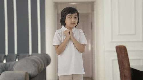 Scared Indian boy afraid of someone