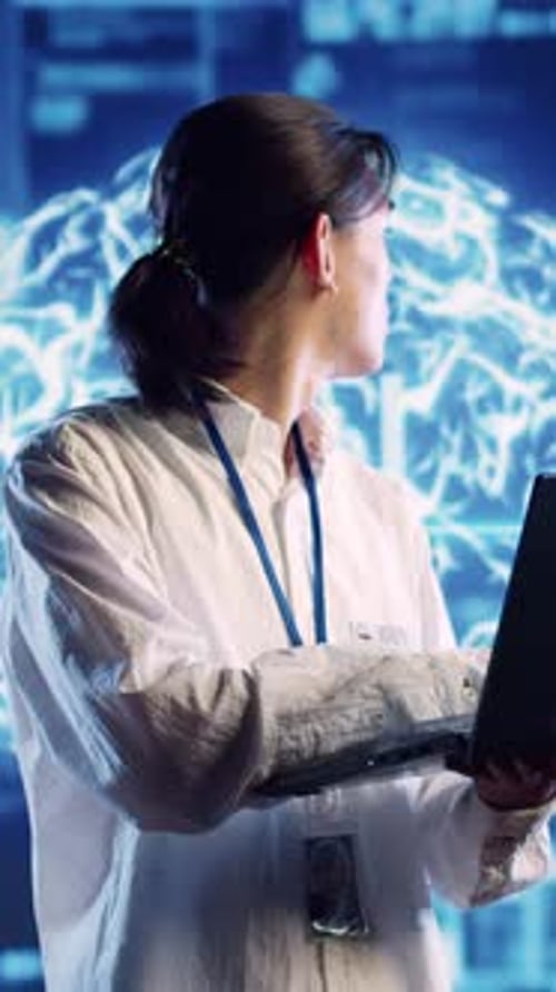 Vertical Video Engineer Doing AI Human Brain Simulation