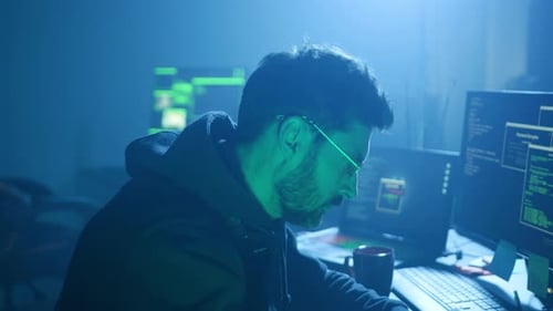 A Skilled Digital Innovator Operating Within a Vibrant Neon Cyber Environment of Today