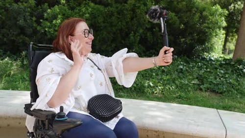 Content Creator in Wheelchair Making Outdoor Video