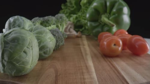 Macro cooking - Macro close up of fresh vegetables on a wooden board
