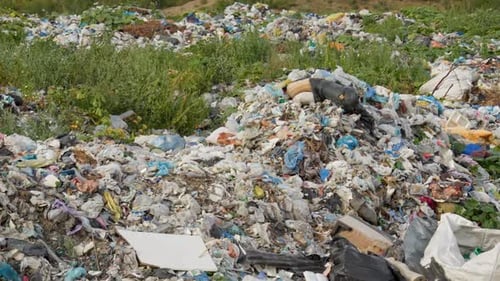 Extensive Landfill Site During The Day