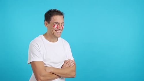 Smiling Young Man with Painted Face