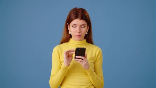 Shocked Woman Reacts to Phone Content