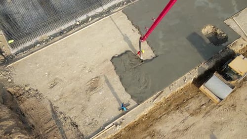 Concrete Mixer Pouring Foundation at Construction