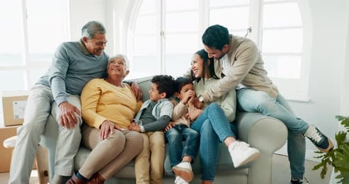 Family Posing Together on Couch in Living Room