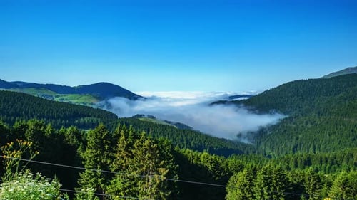 Mountain landscape timelapse, moving clouds. Clouds over the mountains. Summer Landscape. 4K. above