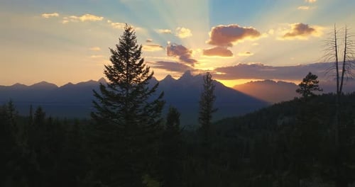 Breathtaking Sunset over Tetons in Wyoming's Majestic Mountain Range