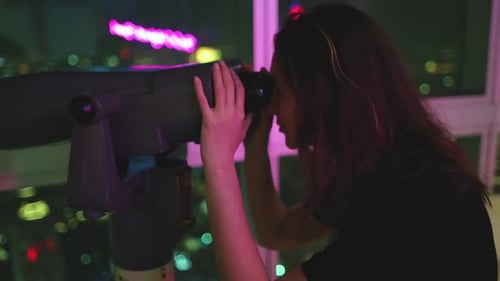 Woman Look in Binoculars Telescope at Night City