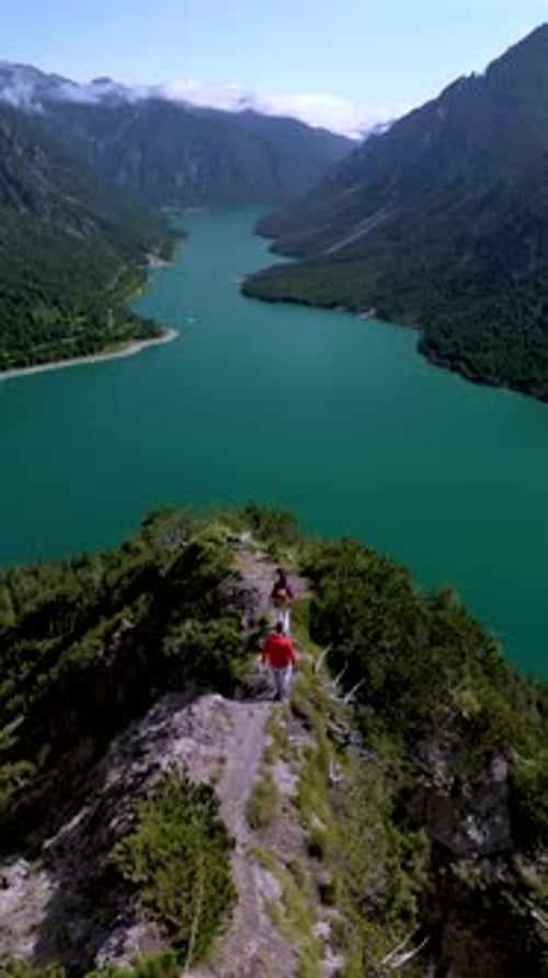 Plansee Austria Stunning Aerial View of a Serene and Tranquil Lake Embraced By Majestic Mountains