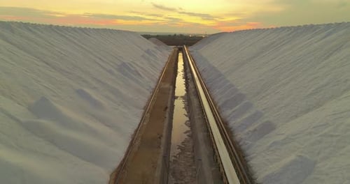 Aerial View of a Salt Flat Factory Besides the Sea Salt Extraction