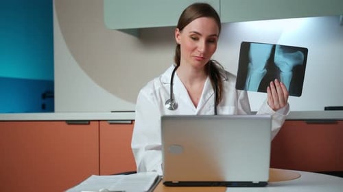 Doctor Explains X-Ray During Telehealth Appointment