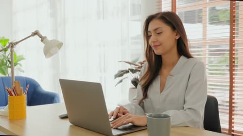 Business Woman relieves her stress after finishing her work