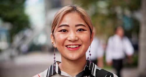 Face, holiday and Asian woman in city, travel and happy for getaway, confident