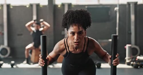 Gym, woman and weight sled for workout or fitness and muscle with strength for body building