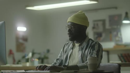 African American Designer Working on Computer