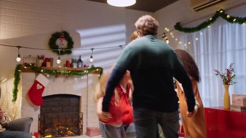 Festive Family Christmas Celebration in Decorated Home