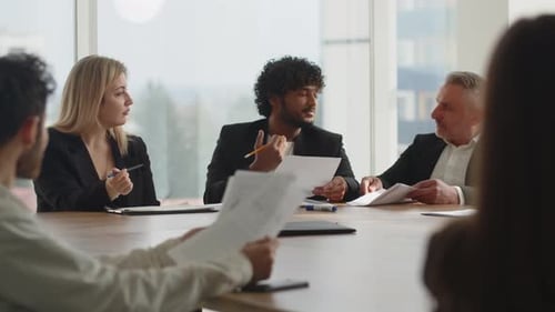 Team Collaboration During a Bright Office Meeting