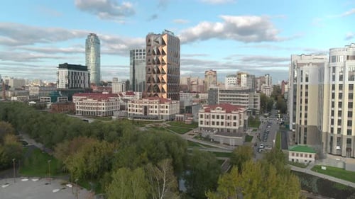 Aerial View of a Beautiful City with High Rise Buildings and Greenery Stock Footage Concept of