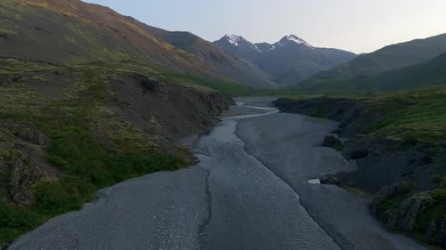 Aerial view of river valley with mountains, Iceland.