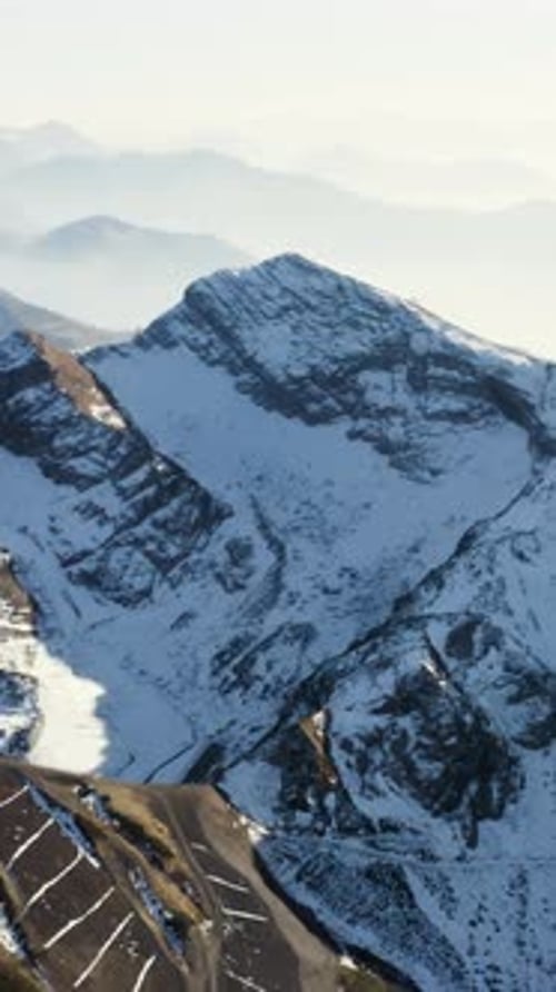 Breathtaking Aerial View of a Frosty Morning in Mountainous Valley HDR Beautiful Pointed Mountain
