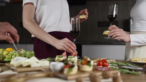 Friends Enjoying Food and Wine Together