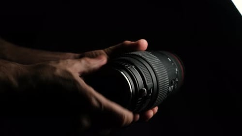 Removing Rear Cap and Inspecting Bayonet Mount of Camera Lens – Close Up