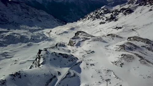 Extreme Winter Terrain Aerial View of Rugged Snow Covered Peaks