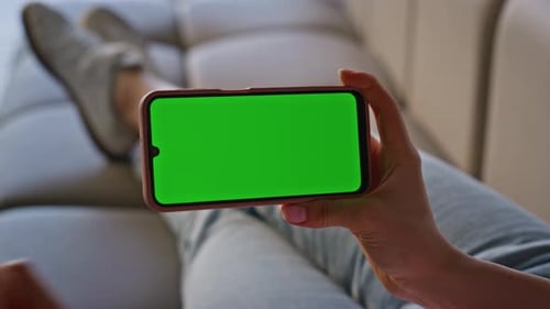 Hand Scrolling Chroma Key Smartphone Sofa Closeup User Holding Template Device