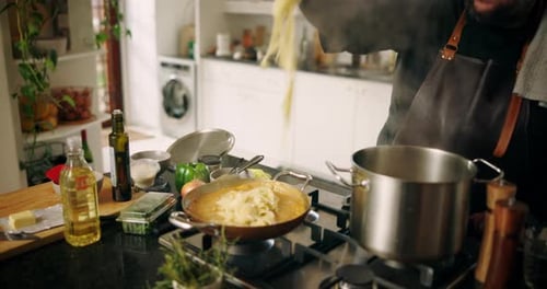 Cooking Pasta in a Bright Kitchen
