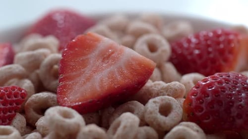 Breakfast Cereal With Fresh Strawberries and Milk