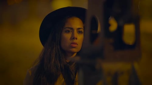 Stylish Woman Wearing Hat at Night