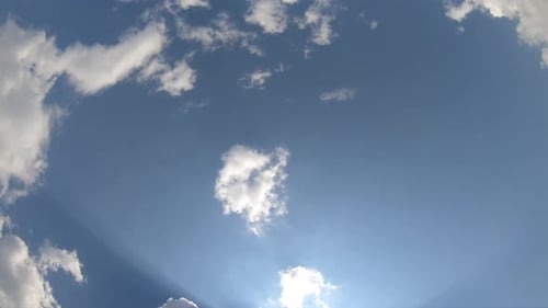 Clouds Drifting Peacefully Across a Blue Sky