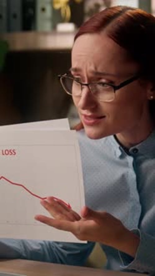 Worried Caucasian Business Woman Talking Laptop Online Call Reviewing Loss Chart Analyzing Sales