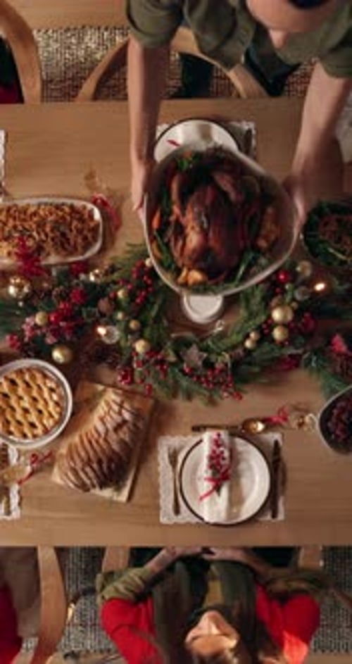 Christmas, above or people in house with turkey, bonding together or clap for roast serving