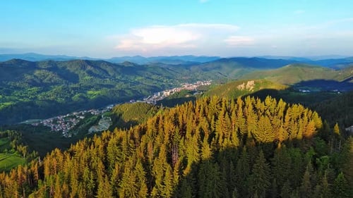 View From Rock to Town of Smolyan with Meadows for Cattle Walking and Houses Between Mountain Range