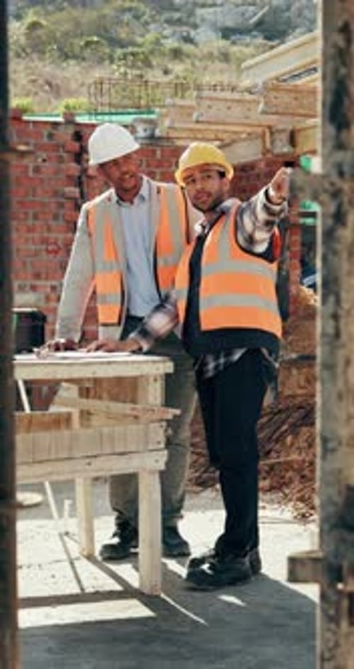Construction, men or pointing with checklist on site for quality control, track progress or safety