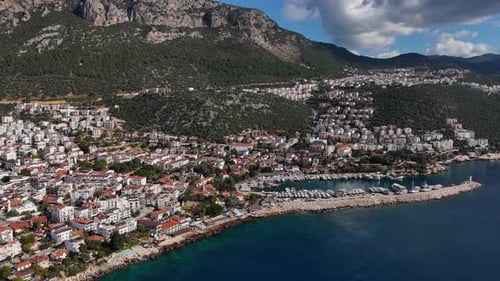 Aerial View of a Coastal Town with Mountains in the Background Kas Turkey