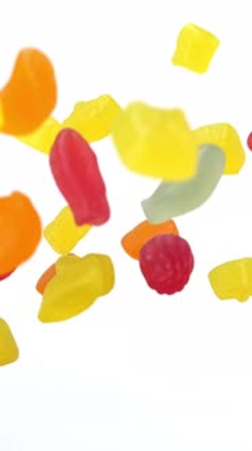 Colorful Gummy Candies Falling into View
