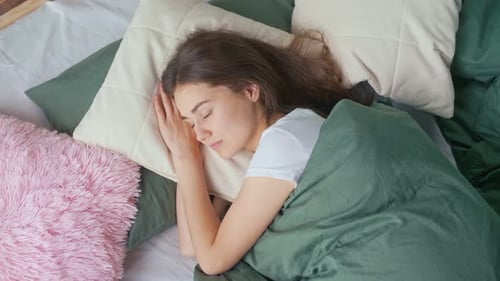 Portrait of a Young Girl Sleeping in a Cozy Bed at Home Wellbeing Good Sleep