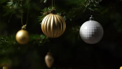 Christmas Tree Ornaments Hanging on Tree