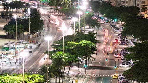 Time-Lapse of Beachside Roadway and Oceanfront at Night