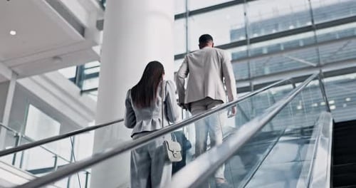 Business people, luggage and airport escalator for walking, global travel