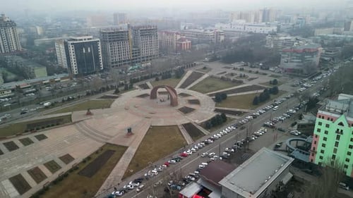 Bishkek Victory Square, drone long shot, rotation around