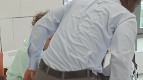 School Boys Chatting after Conversation with Class Teacher